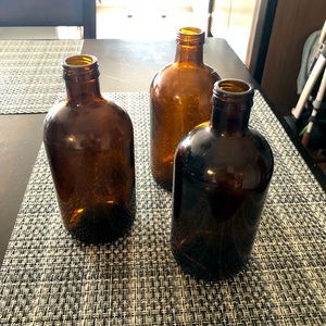 Vintage amber glass vases/bottles.